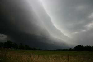 D. Shelf: Strong winds may be coming your way. These dramatic, low-level, horizontal clouds are typically attached to the dark bases of thunderstorms. They form when cold air rushing away from the core of a thunderstorm forces warmer, moist air around the storm upward, causing condensation. As stable layers of air rise, they may condense into even, distinct cloud layers, giving the shelf cloud a stratified appearance, much like a stack of plates. These clouds typically form during the warmer months, and are associated with strong winds, sharp temperature drops, and sharp pressure rises. 