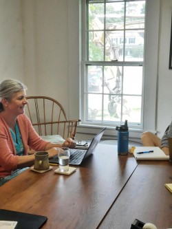 Staff meeting excitement Photo: Emily S. Rowe