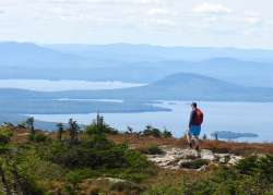 Hiker on Saddleback Mountain Photo: Karinne Heise