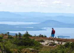 Hiker on Saddleback Mountain Photo: Karinne Heise