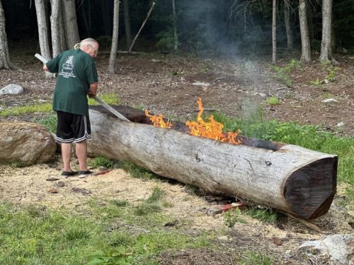 Making dugout canoe
