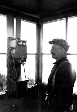 William C. Noble, fire observer, in a tower on New York's Black Mountain, circa 1918. 