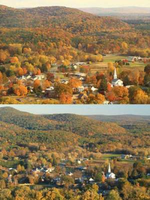 Above: Photo taken October 26, 2010, of the view from Massachusetts' Mount Sugarloaf looking east across the Connecticut River to the village of Sunderland. Below: That same viewpoint on the same date in 2011. Note the almost complete lack of sugar maple color around the village, and the late, drab oaks on the surrounding hillside. 